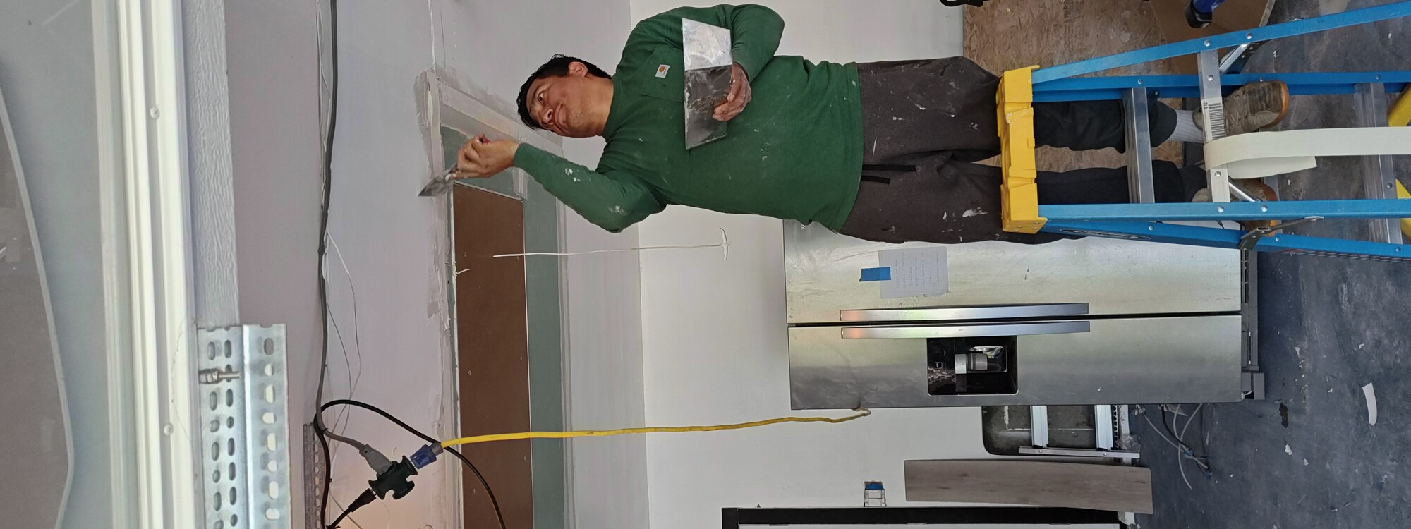 Utility Room Drywall Taping Near Attic Access
